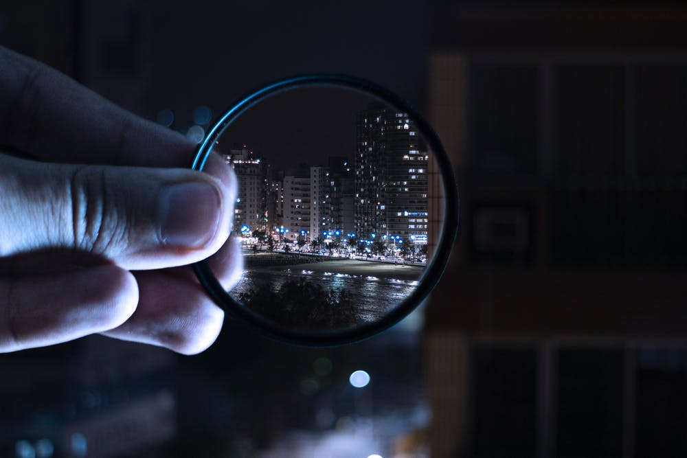 View of a city through a camera lens.