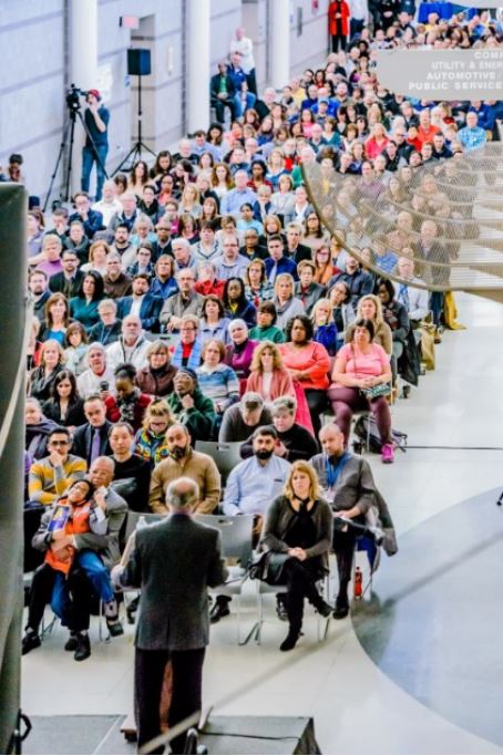 Large group of people gathered for a faculty kickoff at LCC's west campus, 2018.