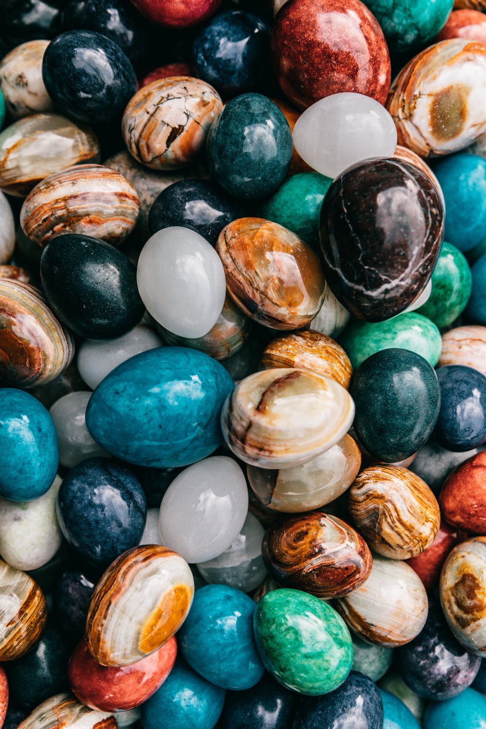 A pile of polished, colored stones