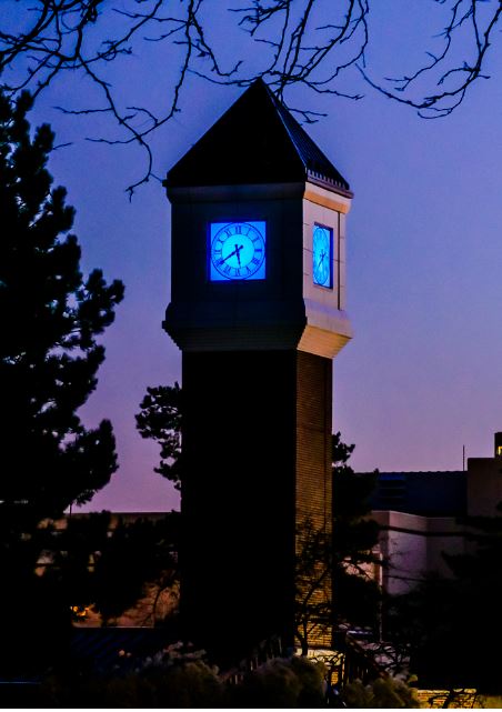 Clock tower, at night on Lansing Community's main campus.