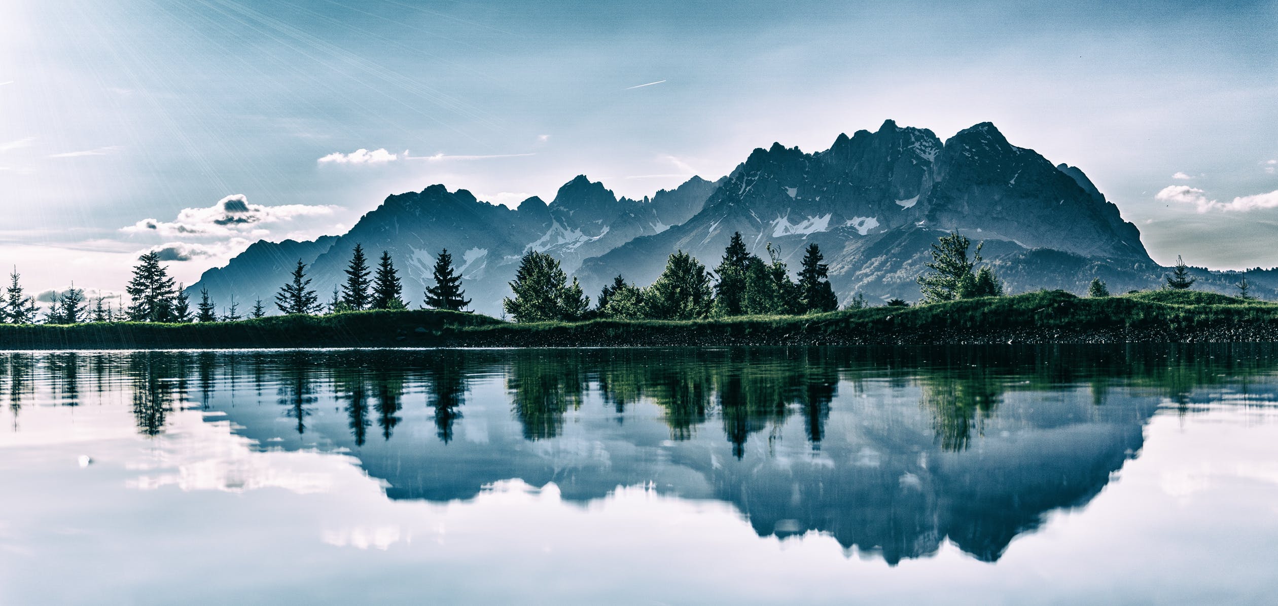 Reflection of trees on a lake.